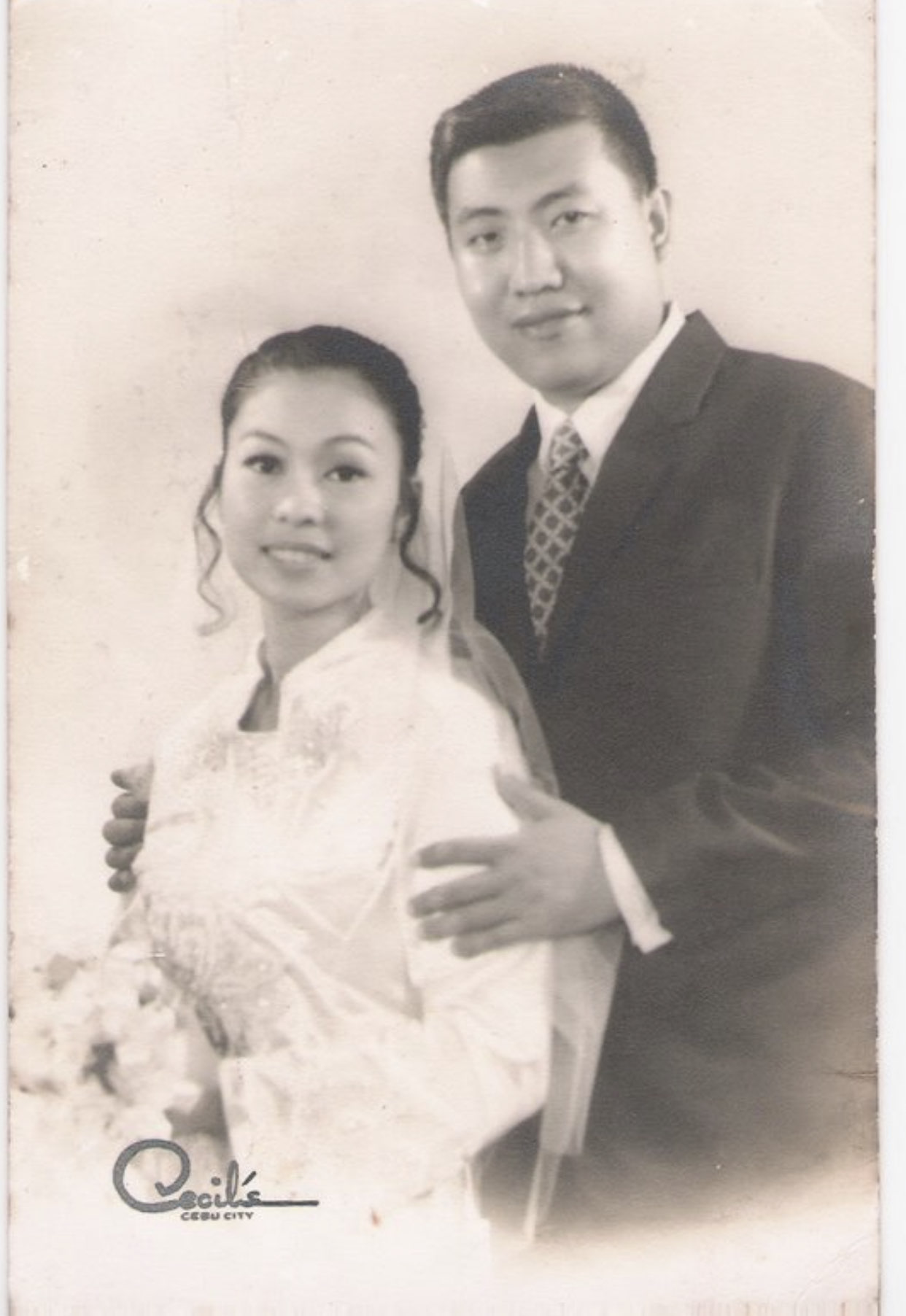 Maning and bride in a studio wedding portrait